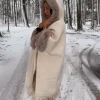 Kapuzen Cape Sedrun